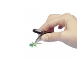Lente con pinzetta di sostegno